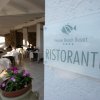 Insegna del ristorante Limone Beach Resort.