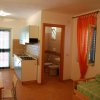 Cucina e bagno in open space.